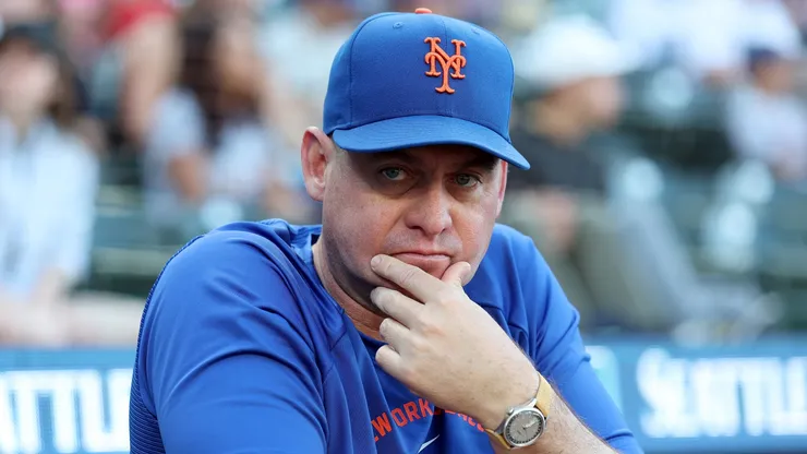 Former manager Carlos Mendoza #64 of the New York Mets looks on.