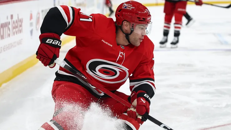 Taylor Hall #71 of the Carolina Hurricanes skates with the puck.