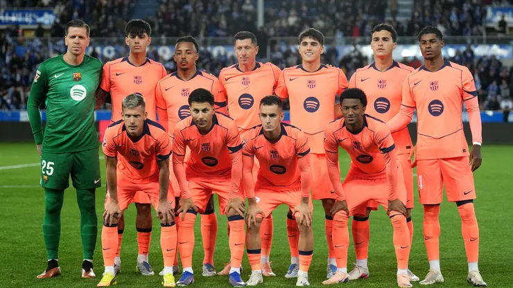 Players of FC Barcelona pose for a team photograph.