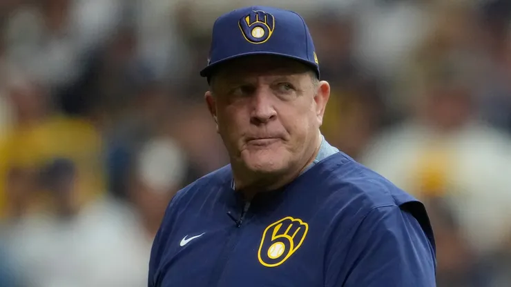 Manager Pat Murphy #00 of the Milwaukee Brewers walks to the dugout.
