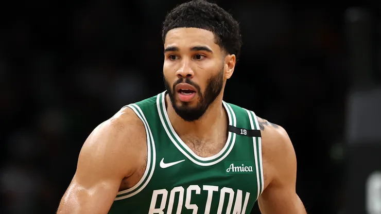 Jayson Tatum #0 of the Boston Celtics dribbles.