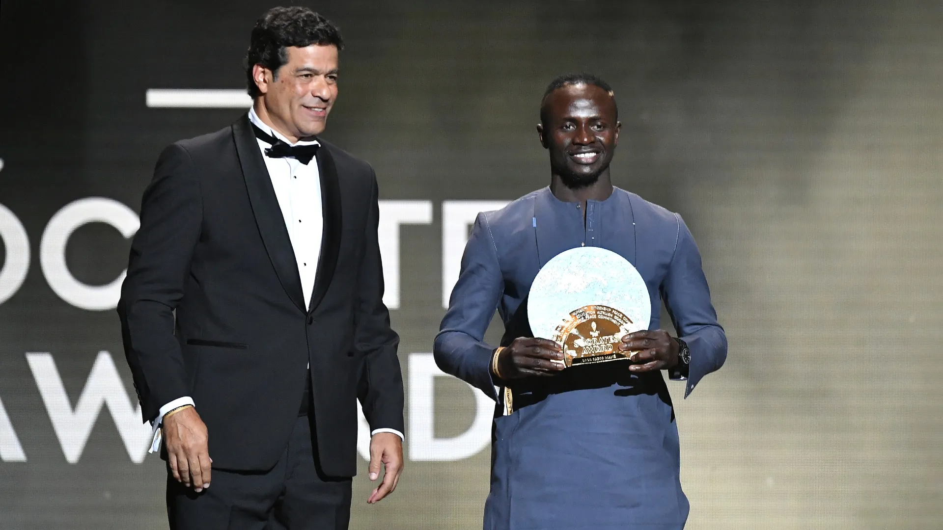 Sadio Mane receives the Socrates Trophy in 2022 (Source: Aurelien Meunier/Getty Images)