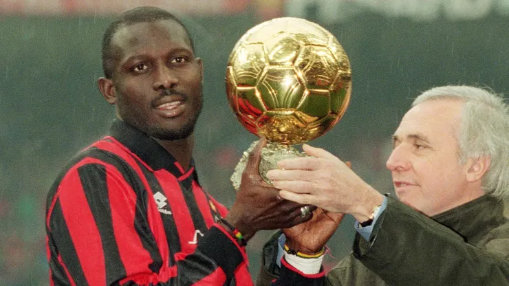 George Weah of AC Milan is presented the 'European Footballer of the Year' award in 1996