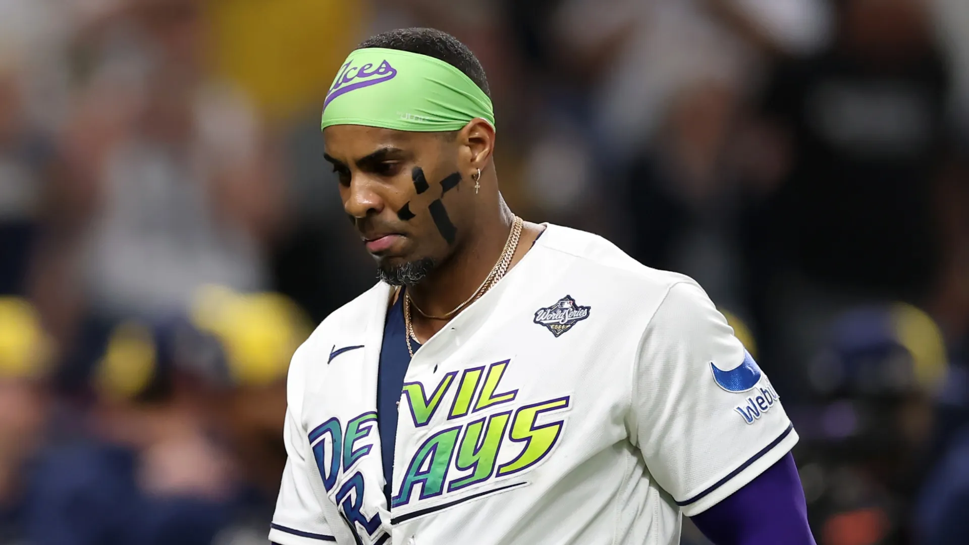 Yandy Díaz #2 of the Tampa Bay Rays walks off the field after losing to the Milwaukee Brewers in game three of the 2026 World Series at Tropicana Field on October 26, 2026 in St Petersburg, Florida.
