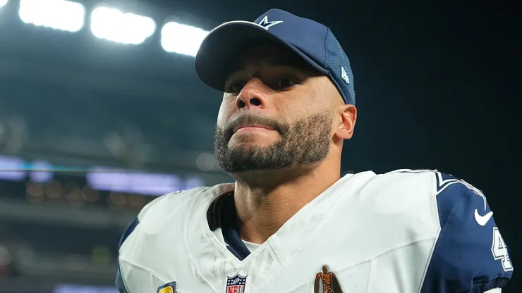 Dak Prescott #4 of the Dallas Cowboys walks off the field.