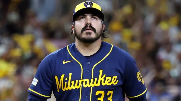JoJo Romero #33 of the Milwaukee Brewers reacts after giving up a home run.