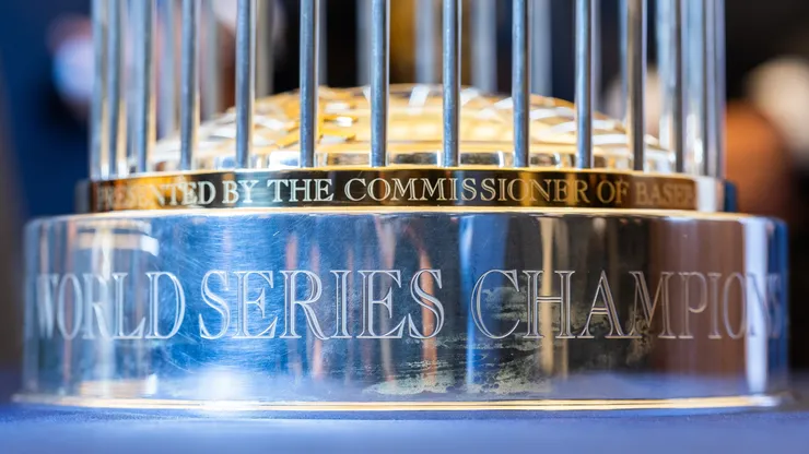 MLB World Series trophy is displayed.