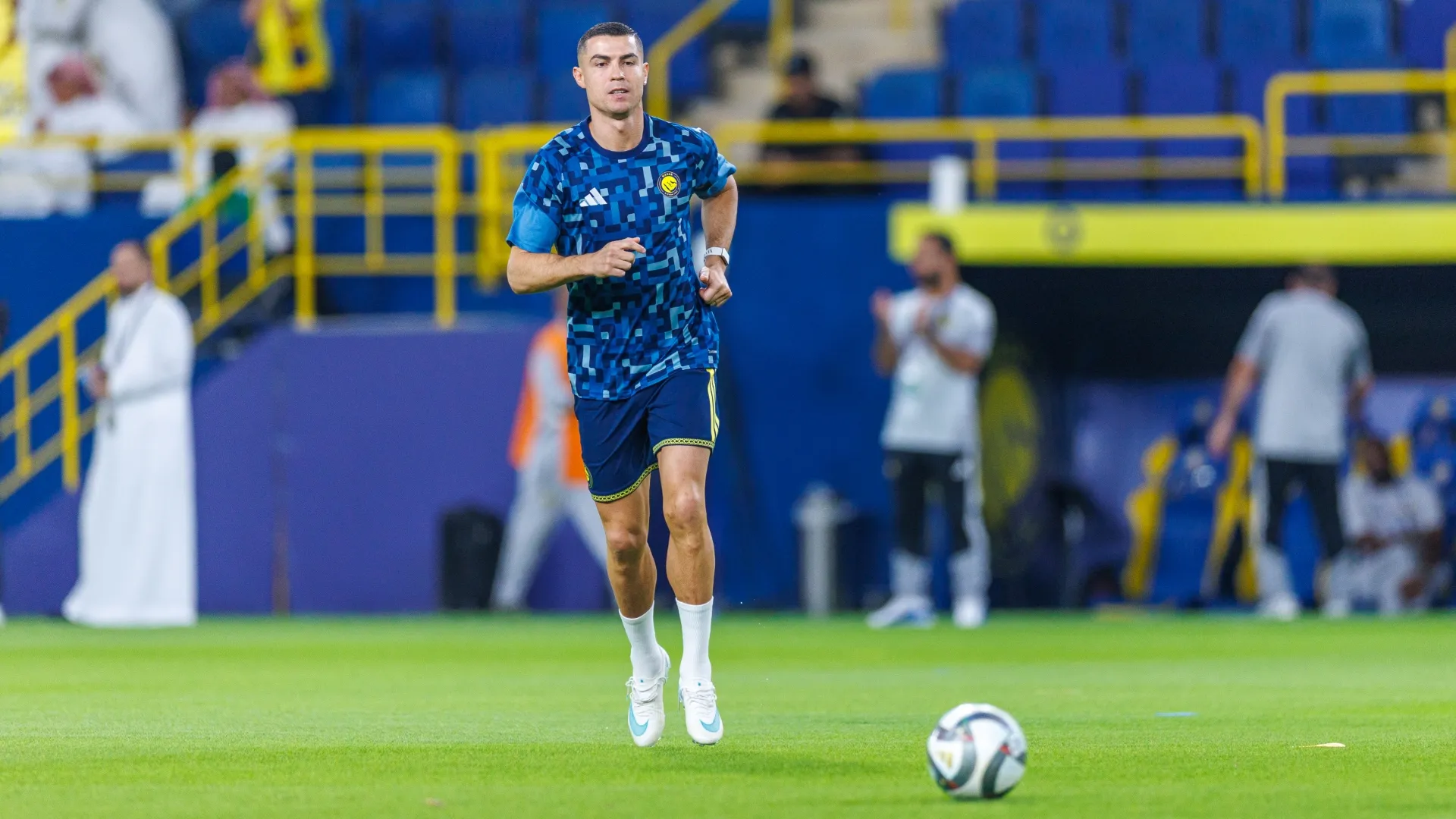 Cristiano Ronaldo warms up during the Saudi Pro League match (Source: Abdullah Ahmed/Getty Images)