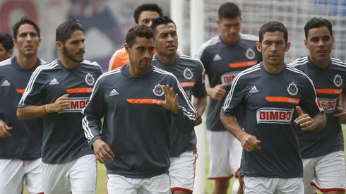 Edgar Solís en Chivas en 2014, junto a jugadores como Patricio Araujo e Israel Castro, entre otros.