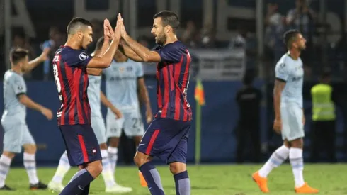 Juan Escobar junto a Raúl Cáceres.