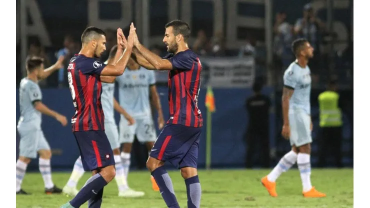 Juan Escobar junto a Raúl Cáceres.