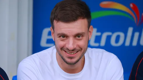 La sonrisa de Anselmi delata toda su felicidad.