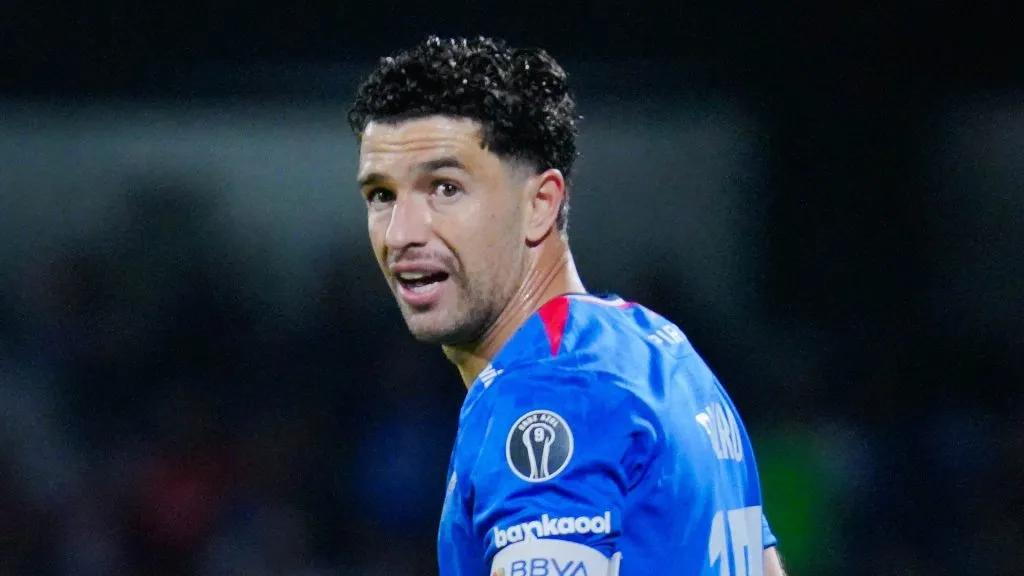 Nacho Rivero y el jugador al que más regañaba.