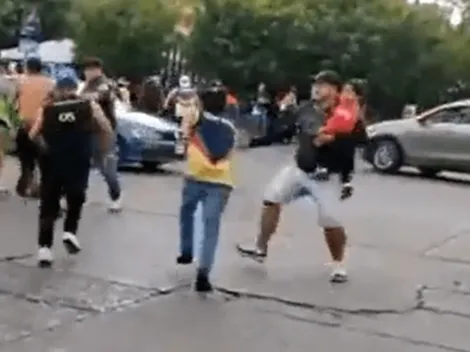 VIDEO: Hombre con niño en brazos golpeó a un aficionado del América