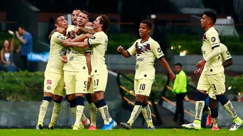 América celebrando el triunfo ante Xolos.