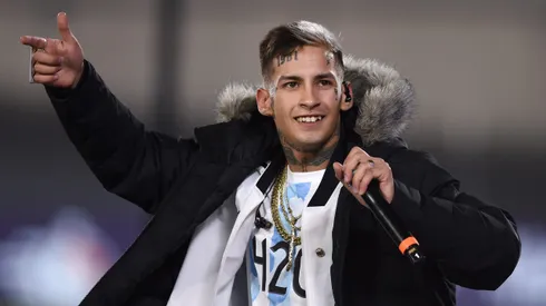 BUENOS AIRES, ARGENTINA - OCTOBER 14: Singer L-Gante performs after a match between Argentina and Peru as part of South American Qualifiers for Qatar 2022 at Estadio Monumental Antonio Vespucio Liberti on October 14, 2021 in Buenos Aires, Argentina. (Photo by Marcelo Endelli/Getty Images)