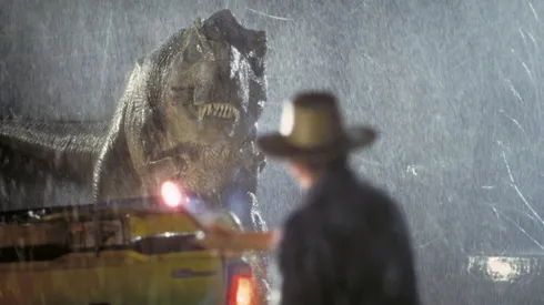 Actor Sam Neill as Dr. Alan Grant takes on a Tyrannosaurus Rex in a scene from the film 'Jurassic Park', 1993. (Photo by Murray Close/Getty Images)