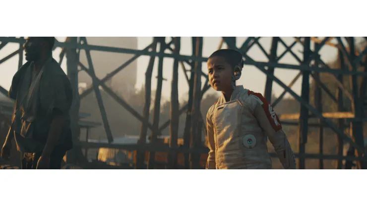 Madeline Voyles as Alphie in 20th Century Studios' THE CREATOR. Photo courtesy of 20th Century Studios. © 2023 20th Century Studios. All Rights Reserved.