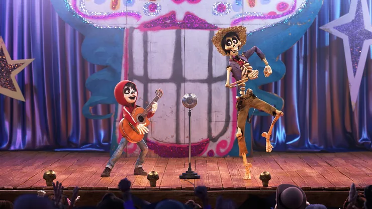 COCO (Pictured) - UN POCO LOCO – In Disney•Pixar’s “Coco,” aspiring musician Miguel (voice of Anthony Gonzalez) teams up with a charming trickster named Héctor (voice of Gael García Bernal) to unravel a generations-old family mystery. Their extraordinary journey through the Land of the Dead includes an unexpected talent show performance of “Un Poco Loco,” an original song in the son jarocho style of Mexican music written by co-director Adrian Molina and Germaine Franco for the film. “Coco” opens in U.S. theaters on Nov. 22, 2017. ©2017 Disney•Pixar. All Rights Reserved.