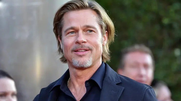Brad Pitt en su paso por una reciente alfobra roja.