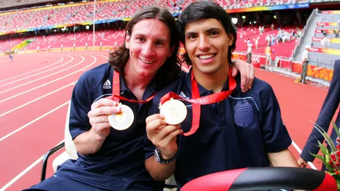 BEIJING – AUGUST 23: Argentinian forwards Lionel Messi (L) and Sergio Aguero gold medal pose during the men's Olympic football tournament medal ceremony at the national stadium in Beijing during the Men's Final between Nigeria and Argentina at the National Stadium on Day 15 of the Beijing 2008 Olympic Games on August 23, 2008 in Beijing, China. (Photo by Koji Watanabe/Getty Images)