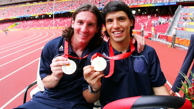 BEIJING - AUGUST 23: Argentinian forwards Lionel Messi (L) and Sergio Aguero gold medal pose during the men's Olympic football tournament medal ceremony at the national stadium in Beijing during the Men's Final between Nigeria and Argentina at the National Stadium on Day 15 of the Beijing 2008 Olympic Games on August 23, 2008 in Beijing, China. (Photo by Koji Watanabe/Getty Images)