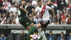 BUENOS AIRES, ARGENTINA - JUNE 3: Lucas Beltrán of River Plate and Rodrigo Bogarin of Defensa y Justicia compete for the ball during a match between River Plater and Defensa y Justicia as part of Liga Profesional 2023 at Estadio Mas Monumental Antonio Vespucio Liberti on June 3, 2023 in Buenos Aires, Argentina. The match was suspended at 25 minutes of play after a fan died after falling down from the Sivori High stands. (Photo by Diego Haliasz/Getty Images)