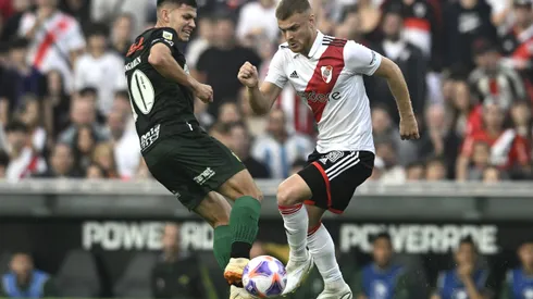BUENOS AIRES, ARGENTINA – JUNE 3: Lucas Beltrán of River Plate and Rodrigo Bogarin of Defensa y Justicia compete for the ball during a match between River Plater and Defensa y Justicia as part of Liga Profesional 2023 at Estadio Mas Monumental Antonio Vespucio Liberti on June 3, 2023 in Buenos Aires, Argentina. The match was suspended at 25 minutes of play after a fan died after falling down from the Sivori High stands. (Photo by Diego Haliasz/Getty Images)