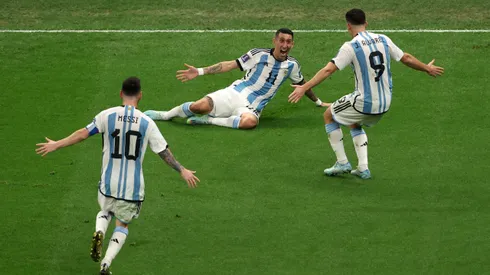 LUSAIL CITY, QATAR - DECEMBER 18: Angel Di Maria of Argentina celebrates with Julian Alvarez and Lionel Messi after scoring the team's second goal past Hugo Lloris of France during the FIFA World Cup Qatar 2022 Final match between Argentina and France at Lusail Stadium on December 18, 2022 in Lusail City, Qatar. (Photo by Alex Pantling/Getty Images)