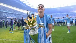 MANCHESTER, ENGLAND - MAY 21: Julian Alvarez of Manchester City celebrates with the Premier League trophy following the Premier League match between Manchester City and Chelsea FC at Etihad Stadium on May 21, 2023 in Manchester, England. (Photo by Michael Regan/Getty Images)