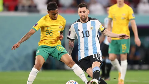 DOHA, QATAR - DECEMBER 03: Lionel Messi of Argentina battles for possession with Keanu Baccus of Australia during the FIFA World Cup Qatar 2022 Round of 16 match between Argentina and Australia at Ahmad Bin Ali Stadium on December 03, 2022 in Doha, Qatar. (Photo by Alex Pantling/Getty Images)