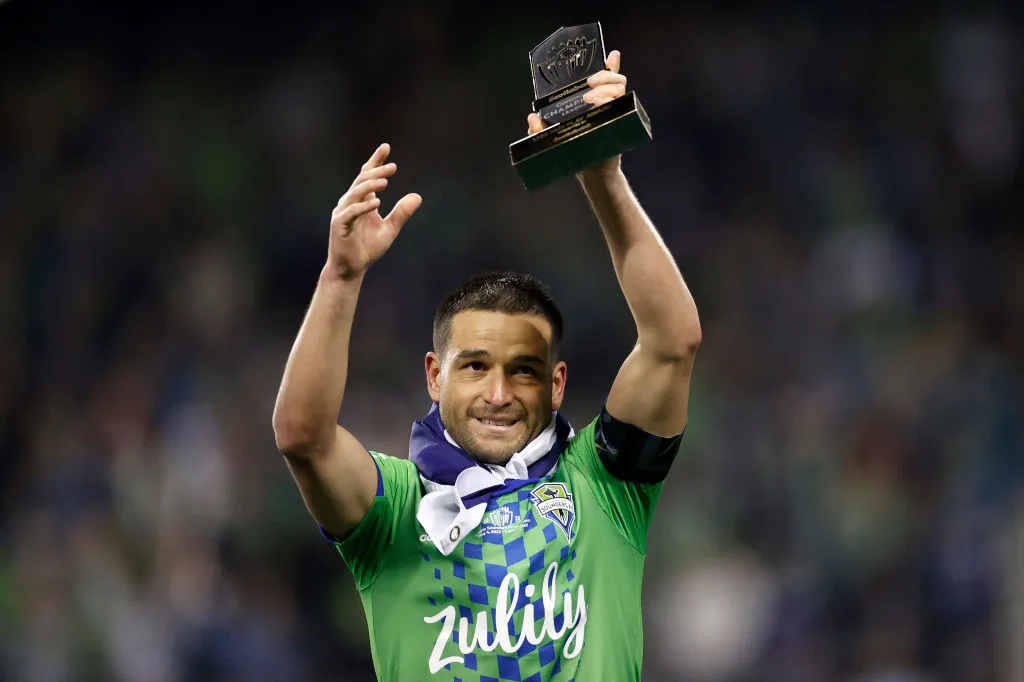 SEATTLE, WASHINGTON – MAY 04: Nicolás Lodeiro #10 of Seattle Sounders reacts after receiving the Fair Player Award after beating Pumas 3-0 during 2022 Scotiabank Concacaf Champions League Final Leg 2 at Lumen Field on May 04, 2022 in Seattle, Washington. (Photo by Steph Chambers/Getty Images)