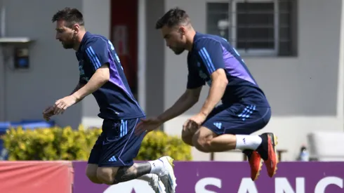 EZEIZA, ARGENTINA – OCTOBER 16: Lionel Messi and Nicolás Tagliafico of Argentina jump during a training session ahead of the Qualifiers match against Peru at Lionel Messi Training Camp on October 16, 2023 in Ezeiza, Argentina. (Photo by Gustavo Garello/Getty Images)