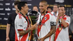 Enzo Pérez y Jonatan Maidana con el Trofeo de Campeones.
