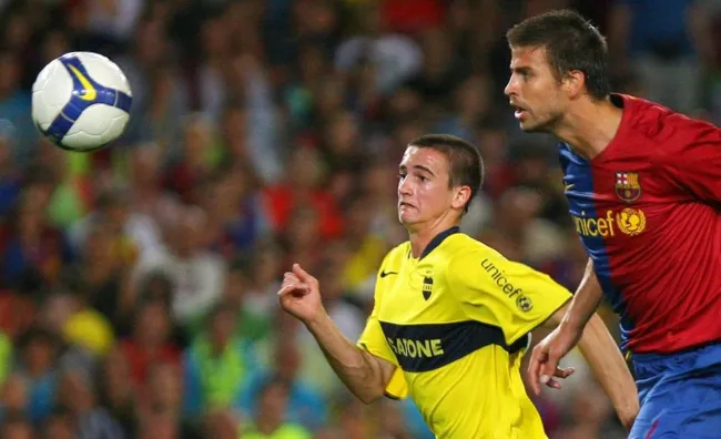 Noir junto a Gerard Piqué, en el Joan Gamper entre Boca y Barcelona