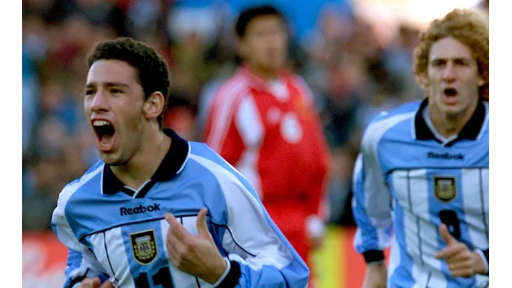 Maxi Rodríguez y Coloccini, campeones juveniles en 2001.