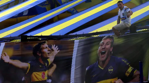BUENOS AIRES, ARGENTINA – FEBRUARY 19: A fan gestures next to banners with images of Martin Palermo, coach of Platense, and former Boca Juniors' player before a match between Boca Juniors and Platense as part of Liga Profesional 2023 at Estadio Alberto J. Armando on February 19, 2023 in Buenos Aires, Argentina. (Photo by Daniel Jayo/Getty Images)