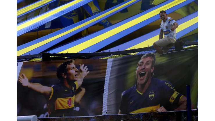 BUENOS AIRES, ARGENTINA - FEBRUARY 19: A fan gestures next to banners with images of Martin Palermo, coach of Platense, and former Boca Juniors' player before a match between Boca Juniors and Platense as part of Liga Profesional 2023 at Estadio Alberto J. Armando on February 19, 2023 in Buenos Aires, Argentina. (Photo by Daniel Jayo/Getty Images)