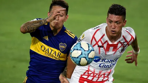 Lucas Merolla enfrentando a Boca.