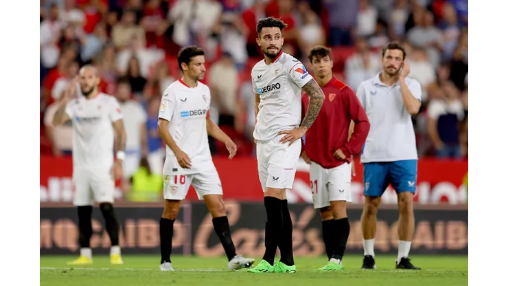 SEVILLE, SPAIN - OCTOBER 01: Alex Telles of Sevilla FC looks dejected following their sides defeat in the LaLiga Santander match between Sevilla FC and Atletico de Madrid at Estadio Ramon Sanchez Pizjuan on October 01, 2022 in Seville, Spain. (Photo by Fran Santiago/Getty Images)