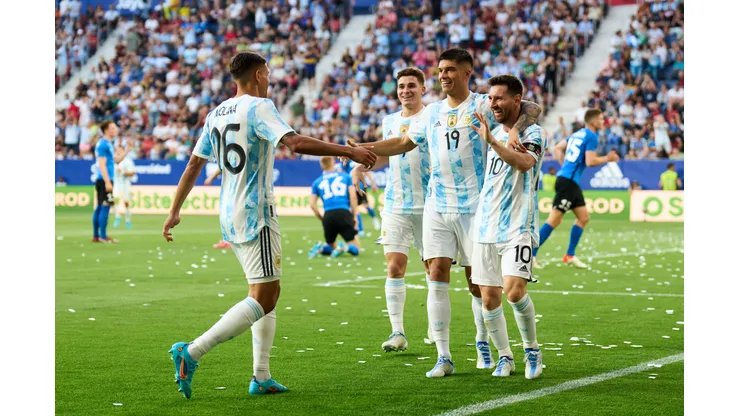 PAMPLONA, SPAIN - JUNE 05: Lionel Messi of Argentina celebrates with his teammates Carlos Joaquin Correa of Argentina after scoring his team's third goal during the international friendly match between Argentina and Estonia at Estadio El Sadar on June 05, 2022 in Pamplona, Spain. (Photo by Juan Manuel Serrano Arce/Getty Images)