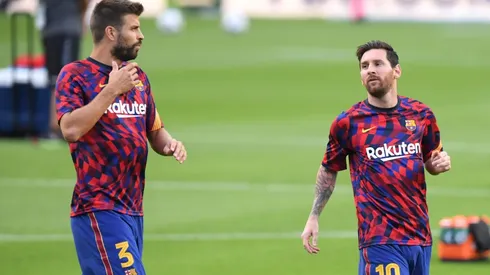 Piqué y Messi en un entrenamiento de Barcelona.