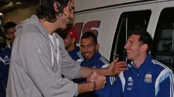 Lionel Messi junto a Luis Scola.