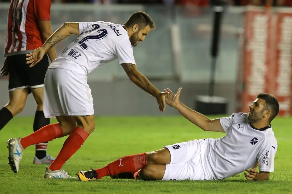 Juan Manuel Martínez y el Puma Gigliotti en el Rojo. (Foto: Getty).