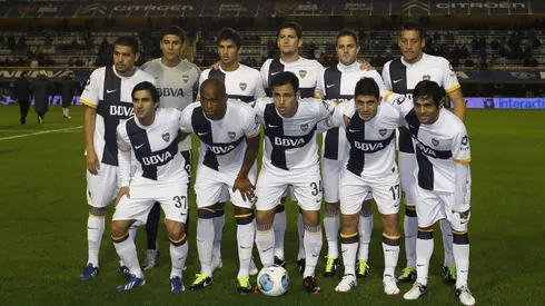 Oscar Ustari junto a Román Riquelme en su paso por Boca.