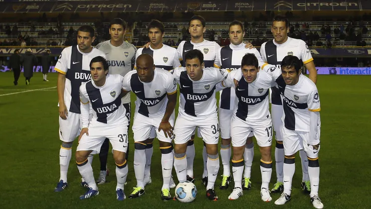 Oscar Ustari junto a Román Riquelme en su paso por Boca.