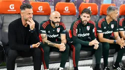 Javier Pinola junto a Martín Demichelis y Germán Lux.