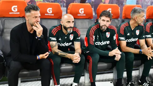 Javier Pinola junto a Martín Demichelis y Germán Lux.