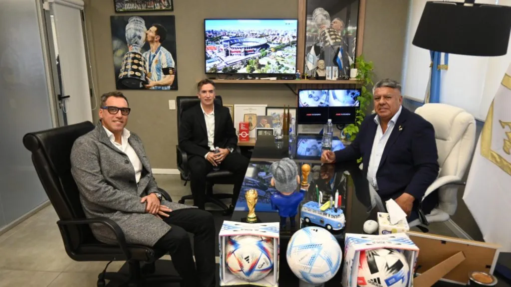 Rapallini junto a Federico Beligoy y Claudio Tapia.