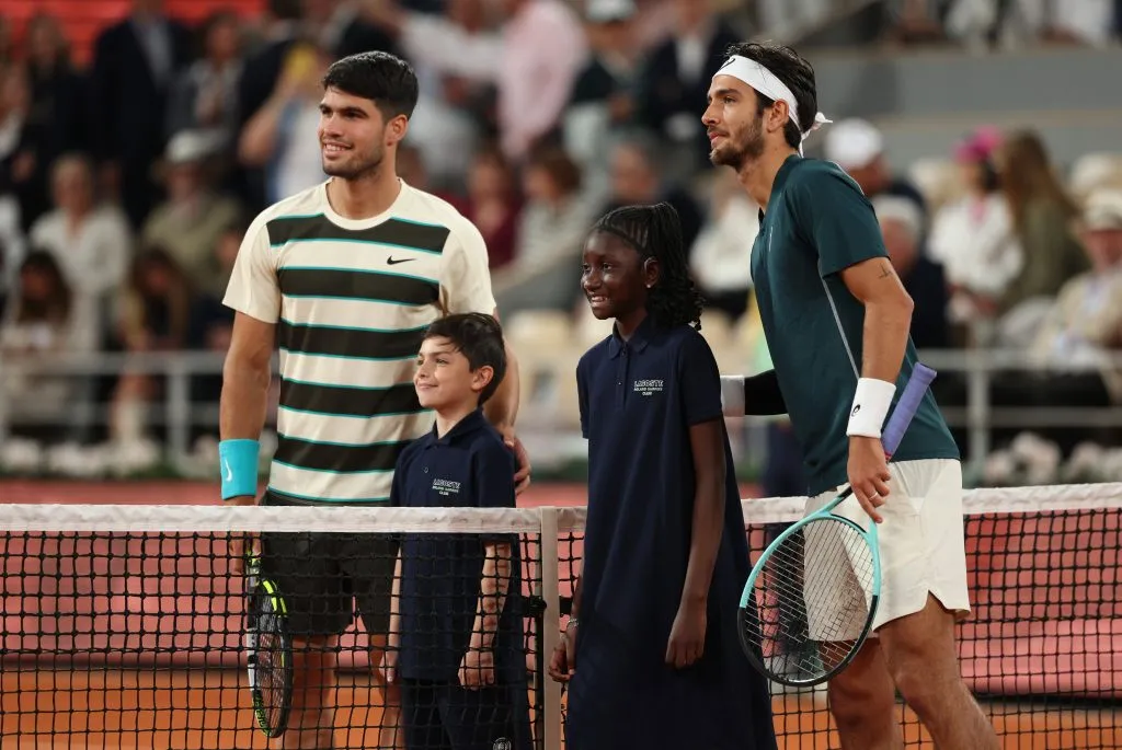 Carlos Alcaraz y Lorenzo Musetti en la antesala de la semifinal. (Foto: Getty).